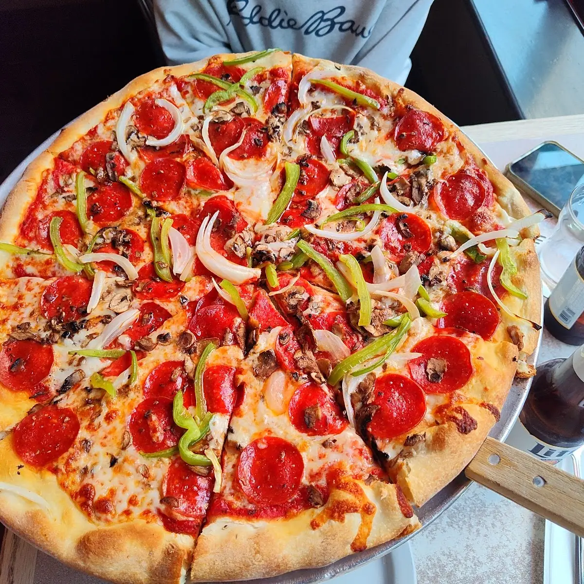 Pepperoni Onion Pepper and Mushroom Pizza