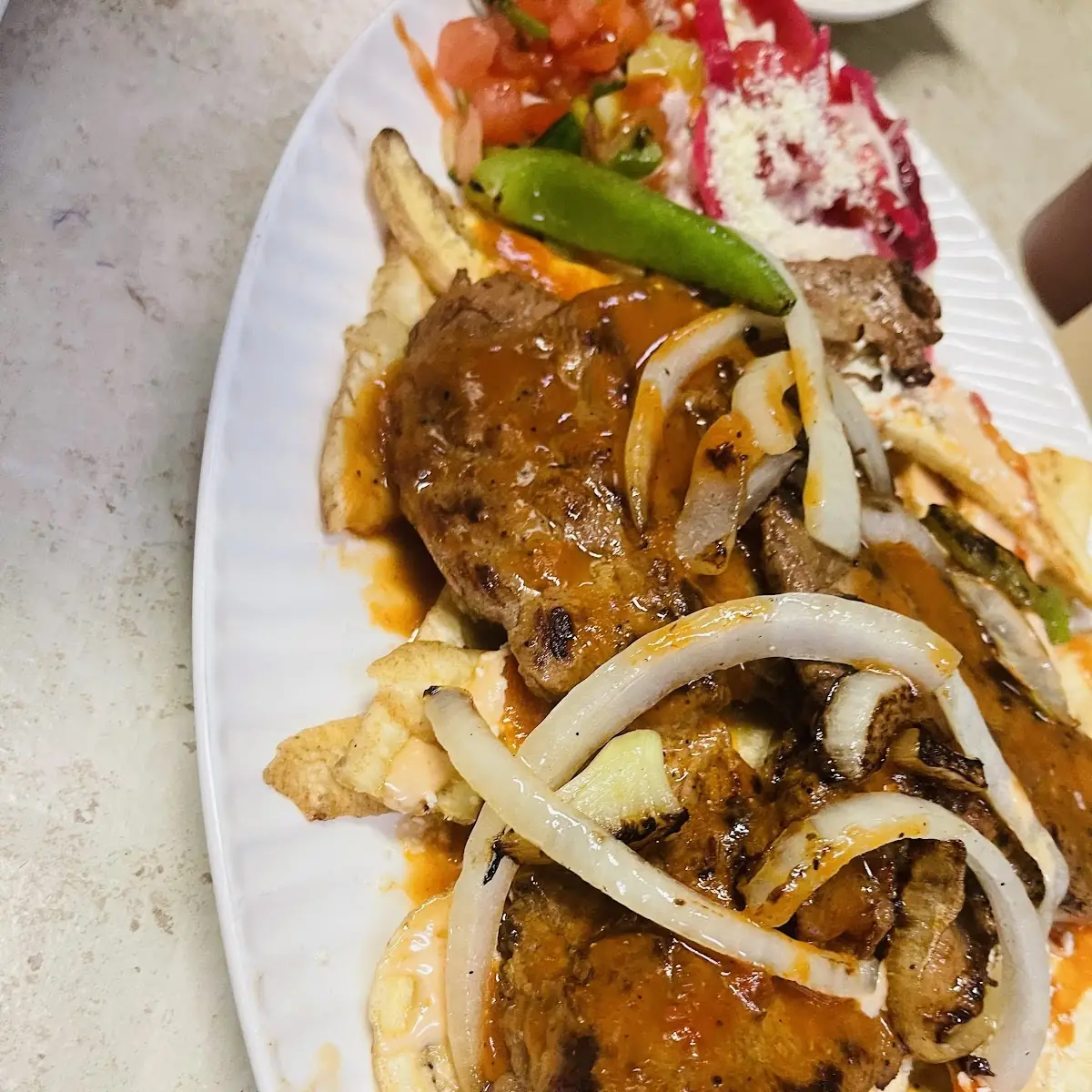 Carne Asada Con Tajadas