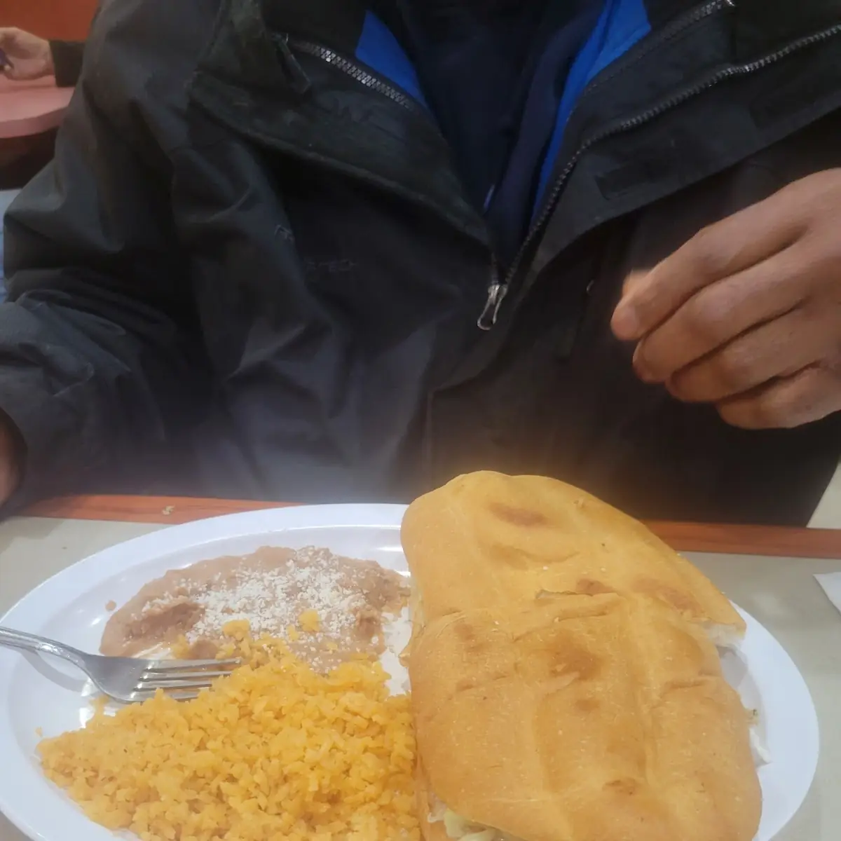 Chicken Torta with Refried Beans and Spanish Rice