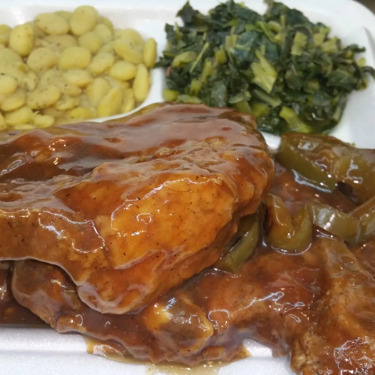 Smothered Pork Chops over Rice