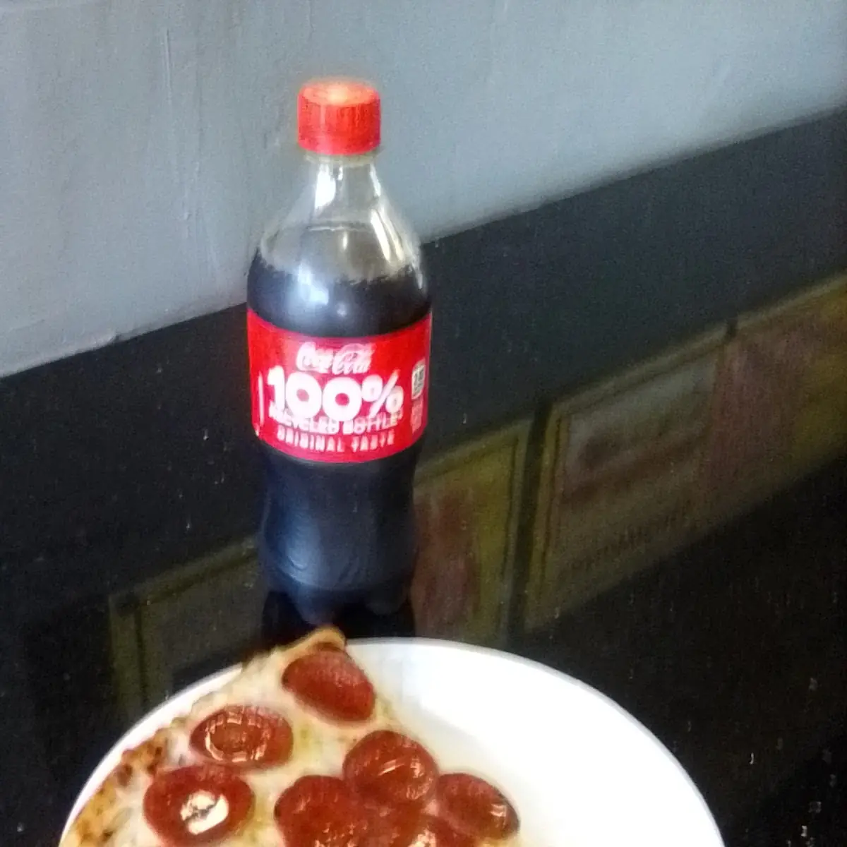 Pepperoni Pizza Slice and a Coca Cola