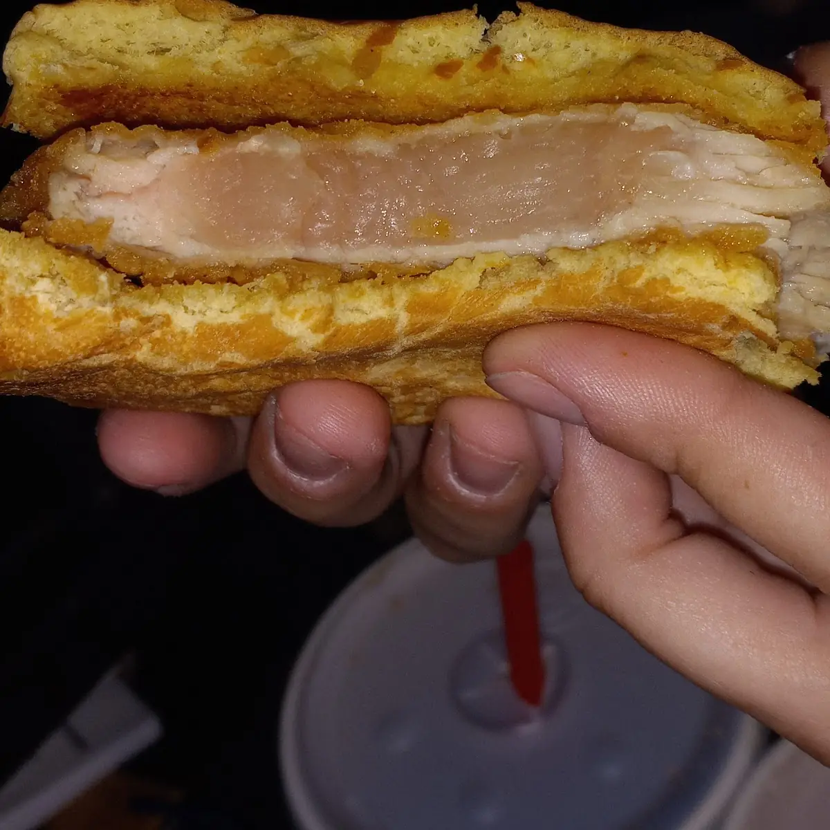 A Raw Partially Cooked Chicken Sandwich