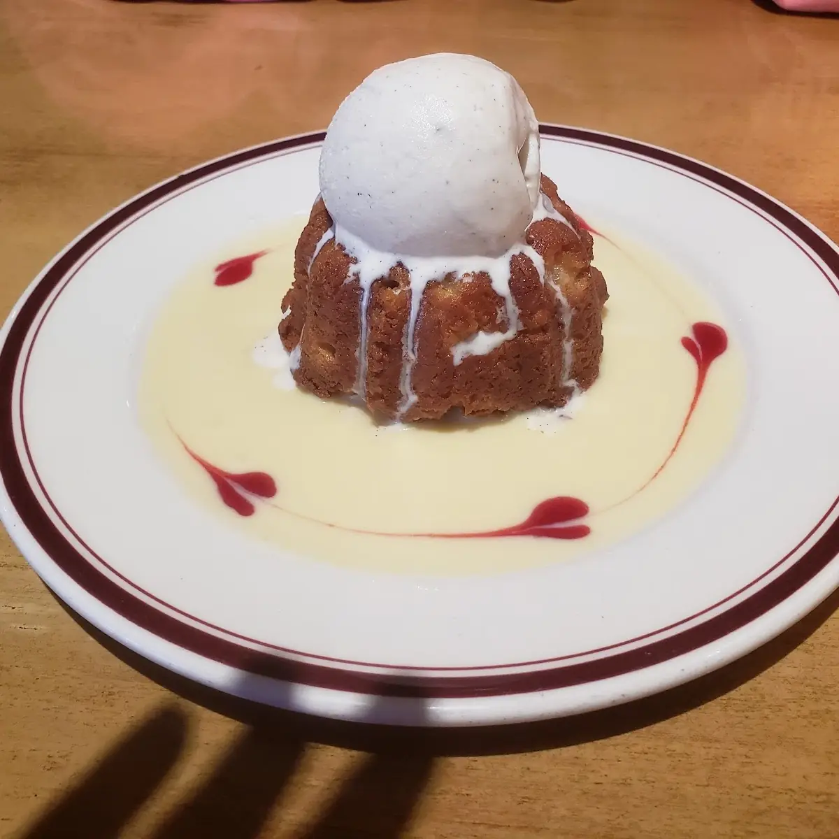 Warm White Chocolate Bread Pudding with Vanilla Ice Cream & Caramel