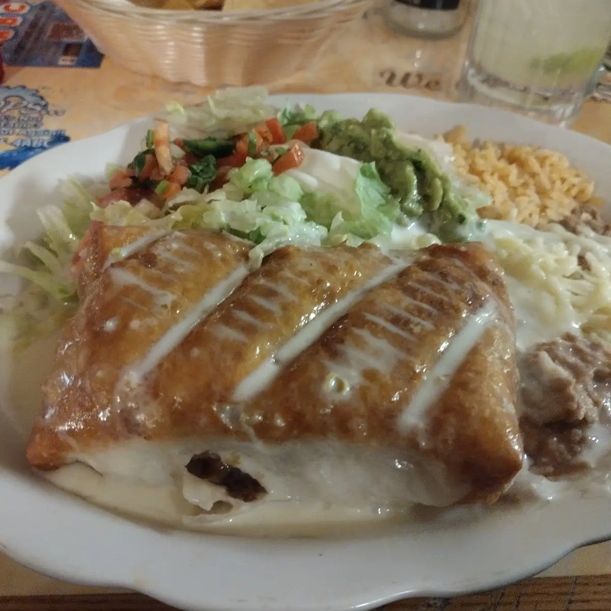 Chimichanga with Beef Tips Refried Beans Spanish Rice
