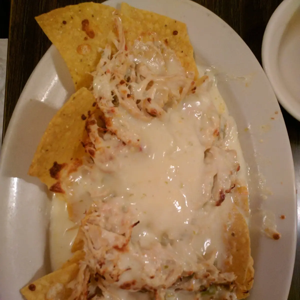 Nachos with Shredded Chicken and Extra Cheese