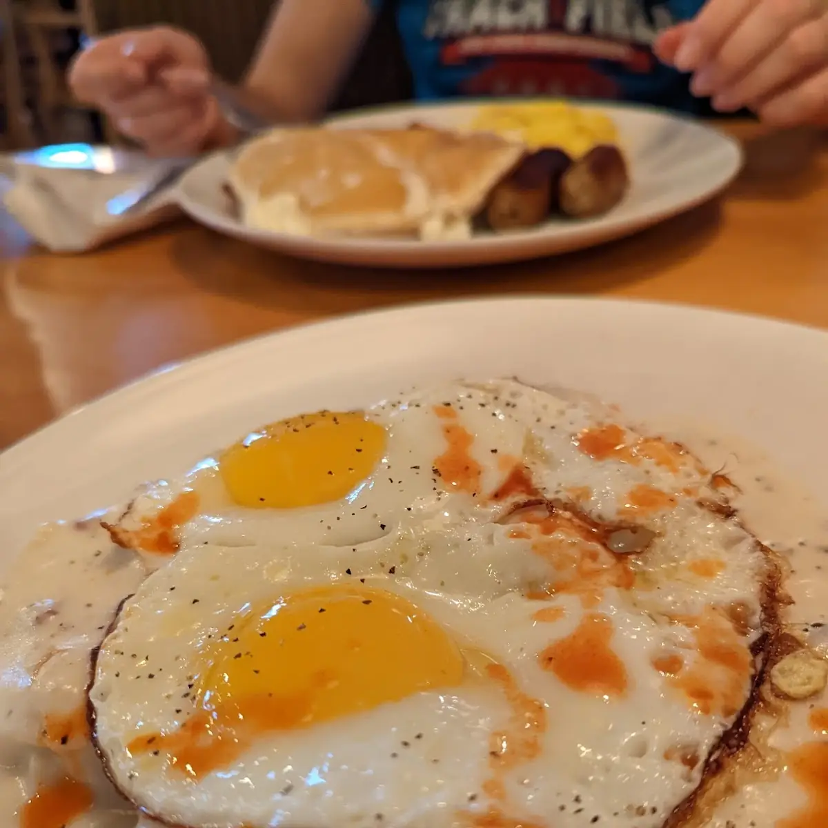 Biscuits and Gravy with Two Eggs Sunny Side Up