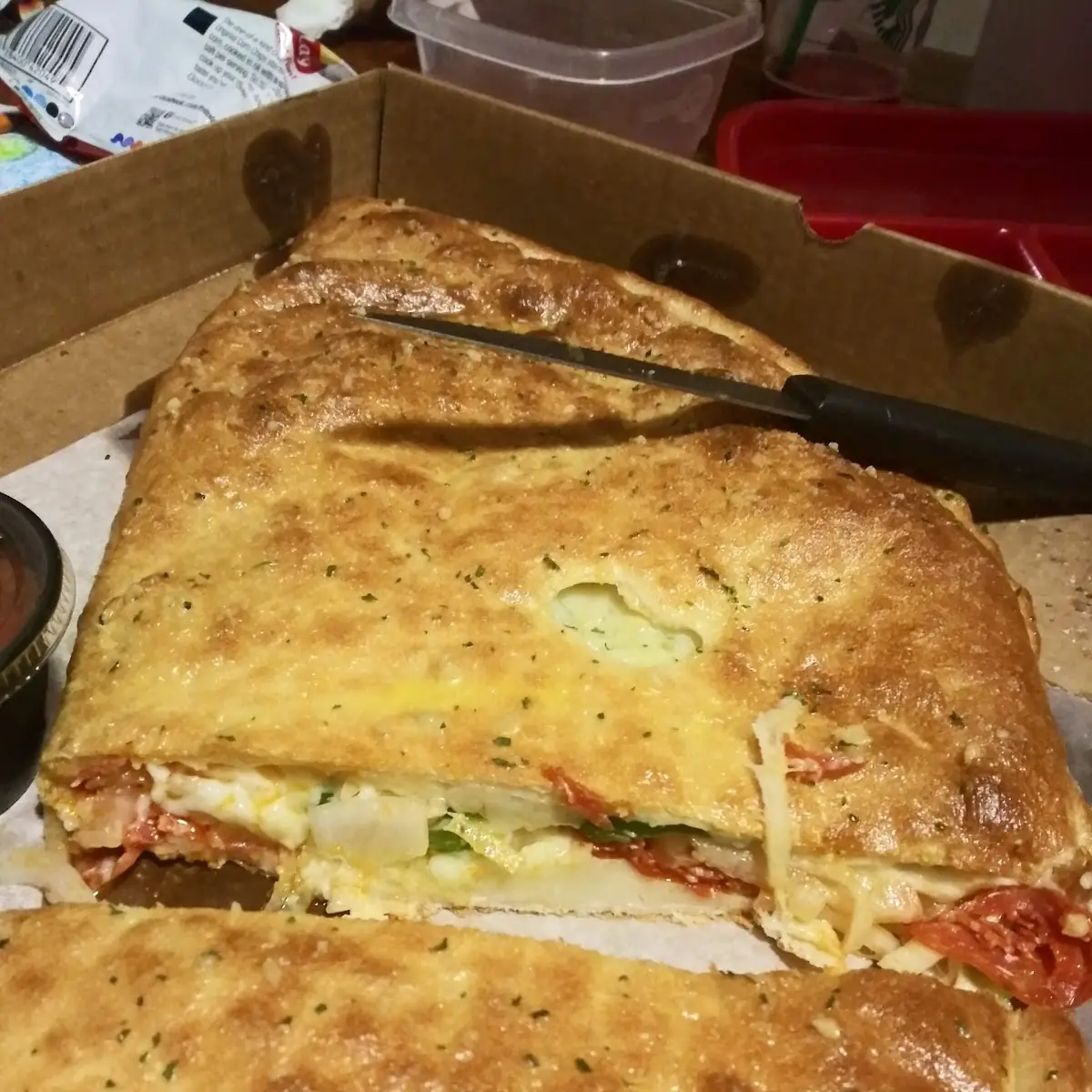 Large Calzone with Mozzarella Cheese and Peppers and Onion and Pepperoni