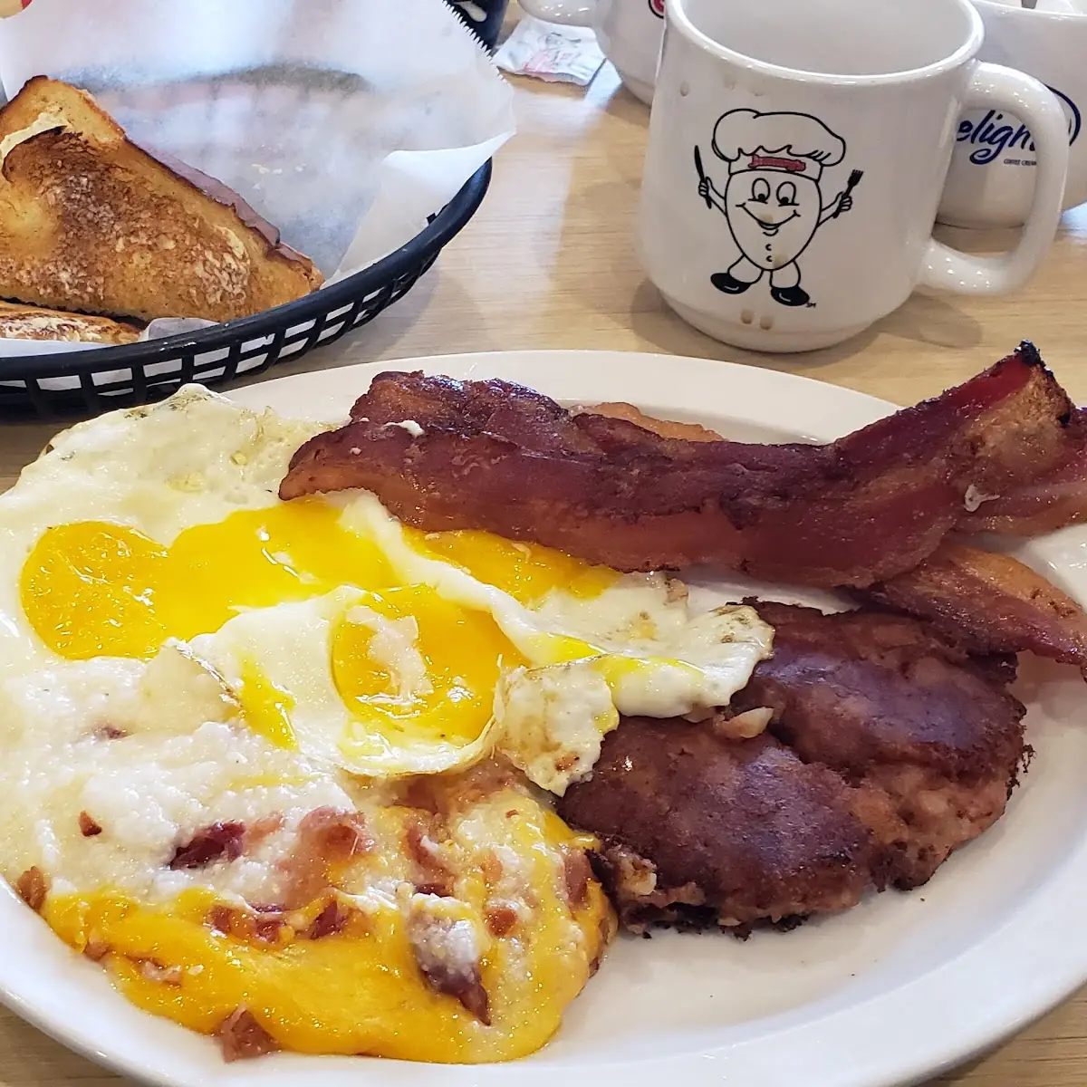 Eggs Sunny Side Up w Cheesy Grits & Bacon Bits Corned Beef Hash & Bacon Cooked Extra Crispy