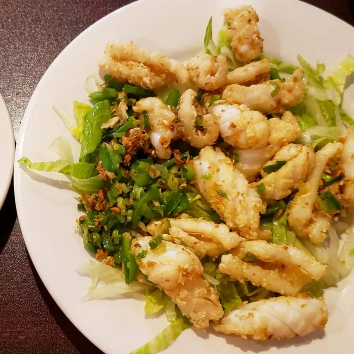 Salty Fried Squid Served with Steamed Rice