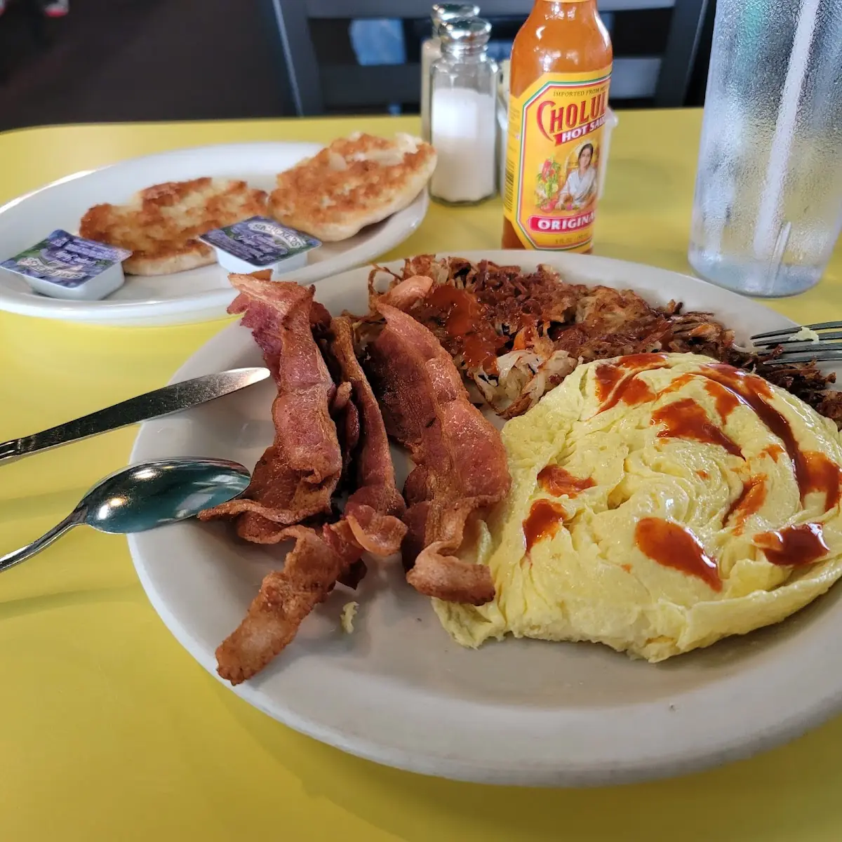 2 Eggs Scrambled with Bacon and Hashbrowns Grilled English Muffin