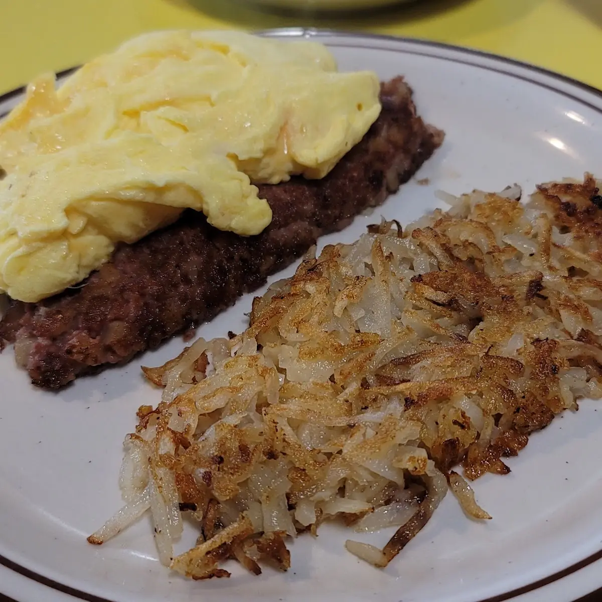 Corned Beef Hash 2 Eggs Scrambled with Cheddar Hash Browns