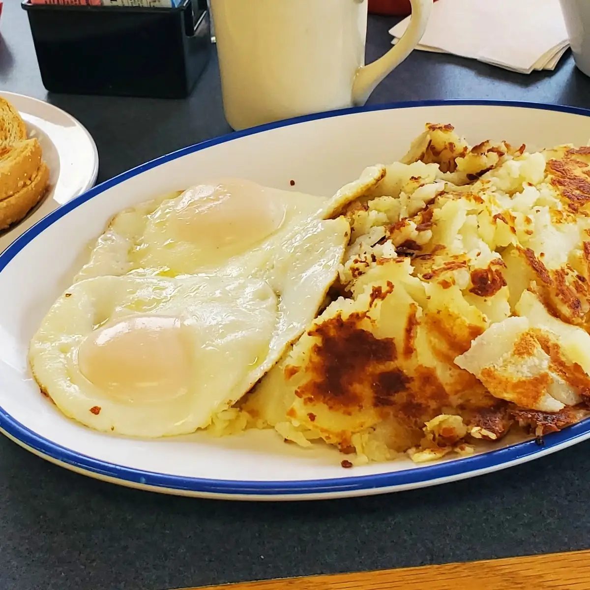 Eggs Basted Hash Browns Rye Toast
