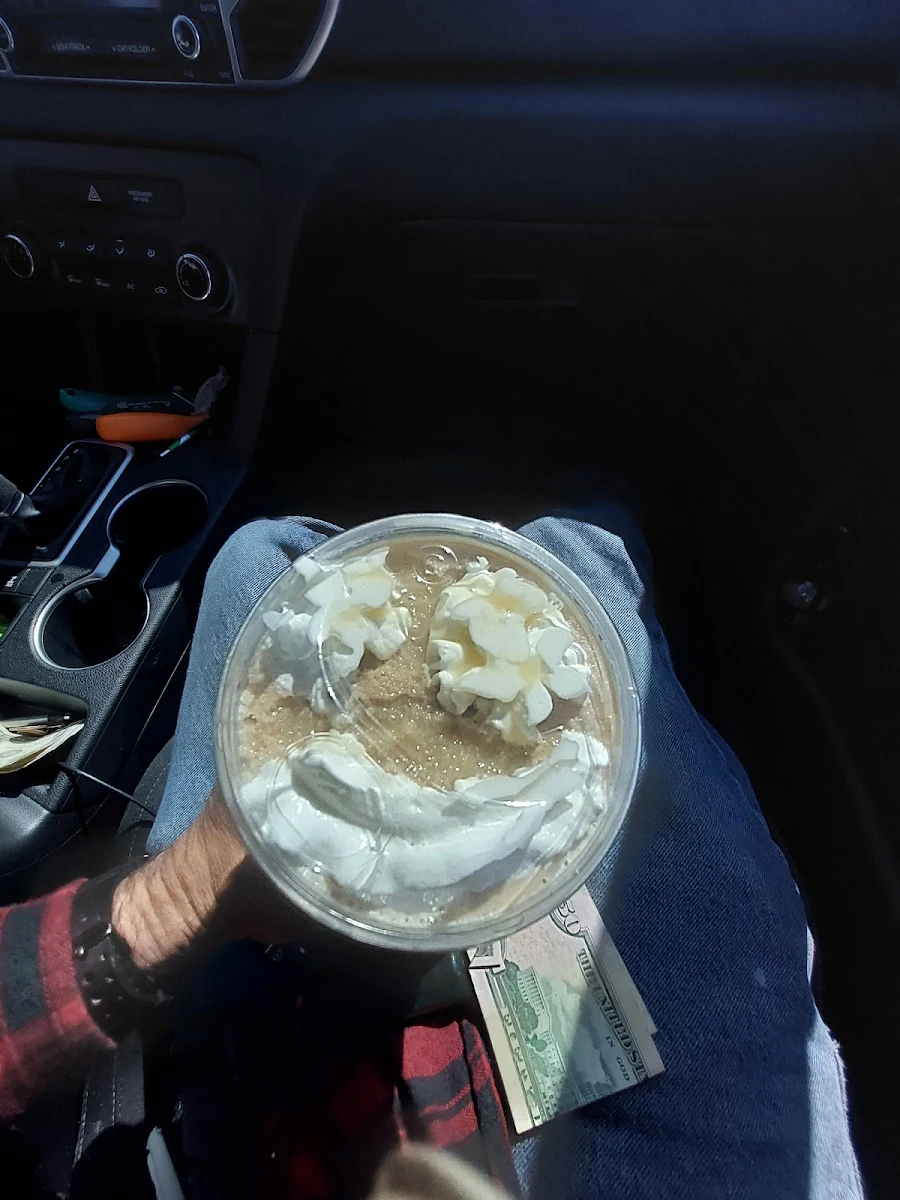 Caramelizer with White Chocolate Whipped Cream and White Chocolate Drizzled on Top