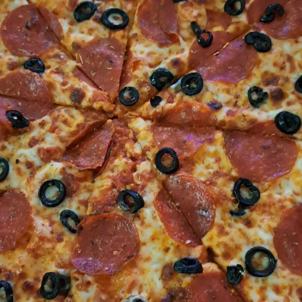 Pepperoni and Black Olives Thin Crust