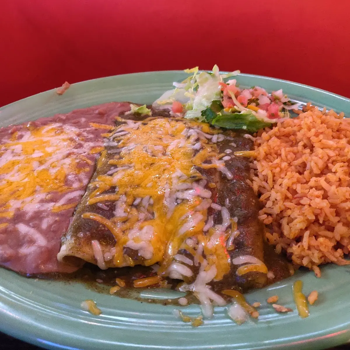 Chicken Enchiladas Verdes with Rice and Beans