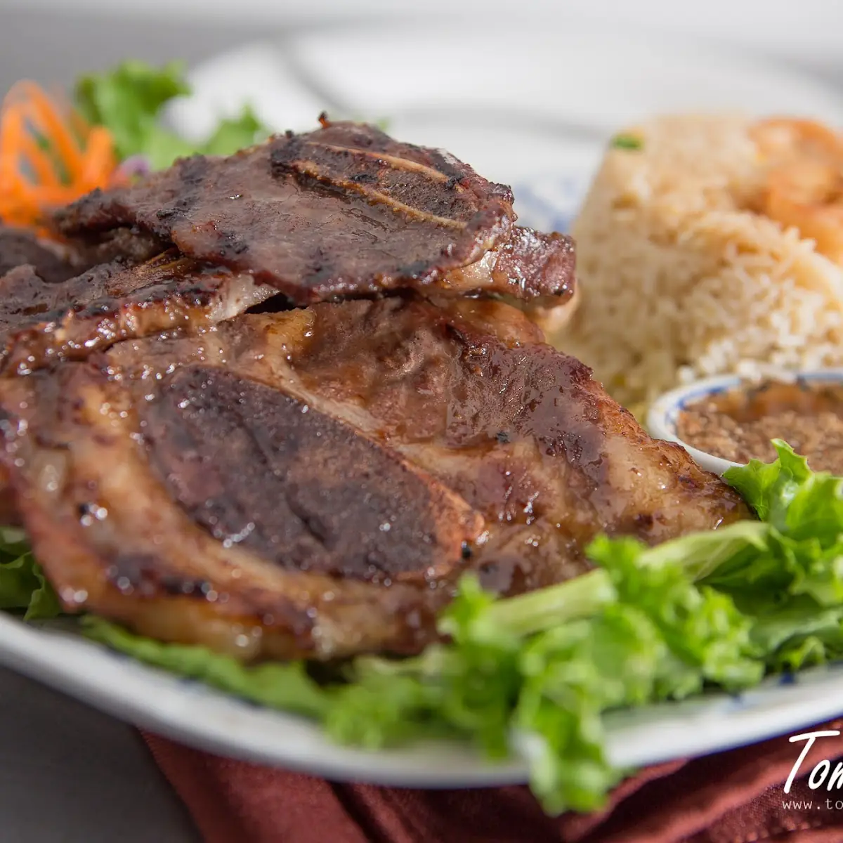 Charbroiled Pork Chop 2 pcs Dinner Special Free Thai Tea or Thai Coffee