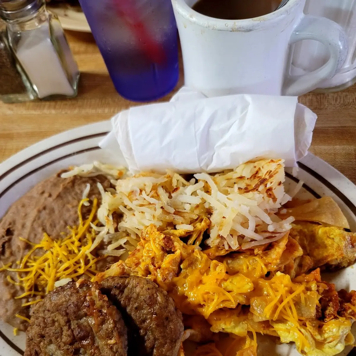 Chilaquiles with Hashbrowns and Refried Beans