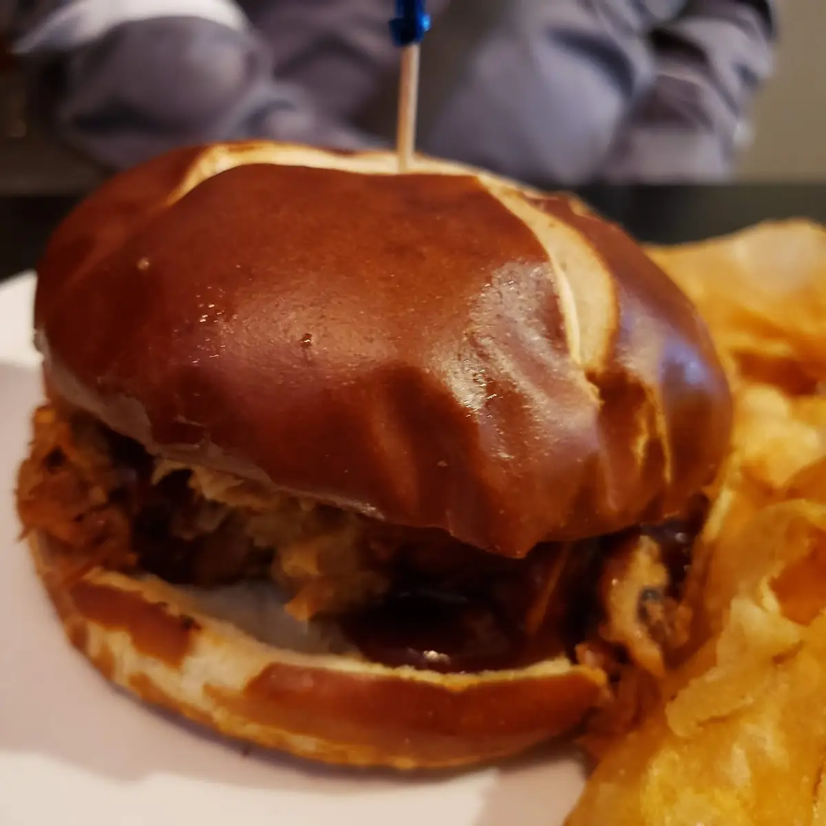 Pulled Pork on a Pretzel Bun