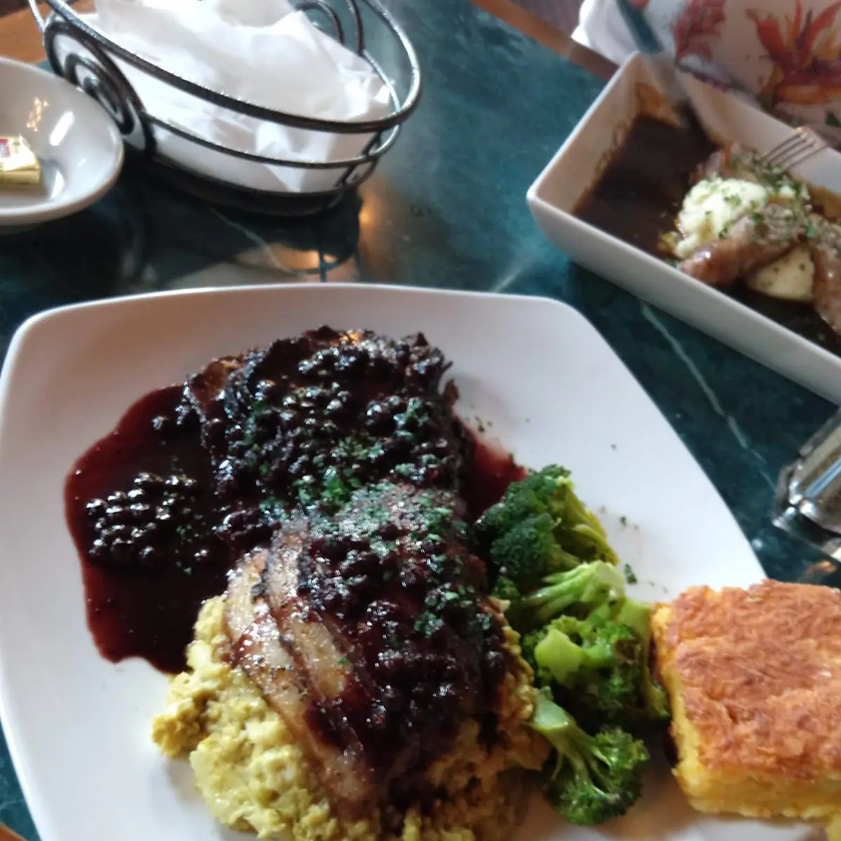 Beef Brisket with Blue Berry BBQ Sauce Curried Mashed Califlower & Cornbread