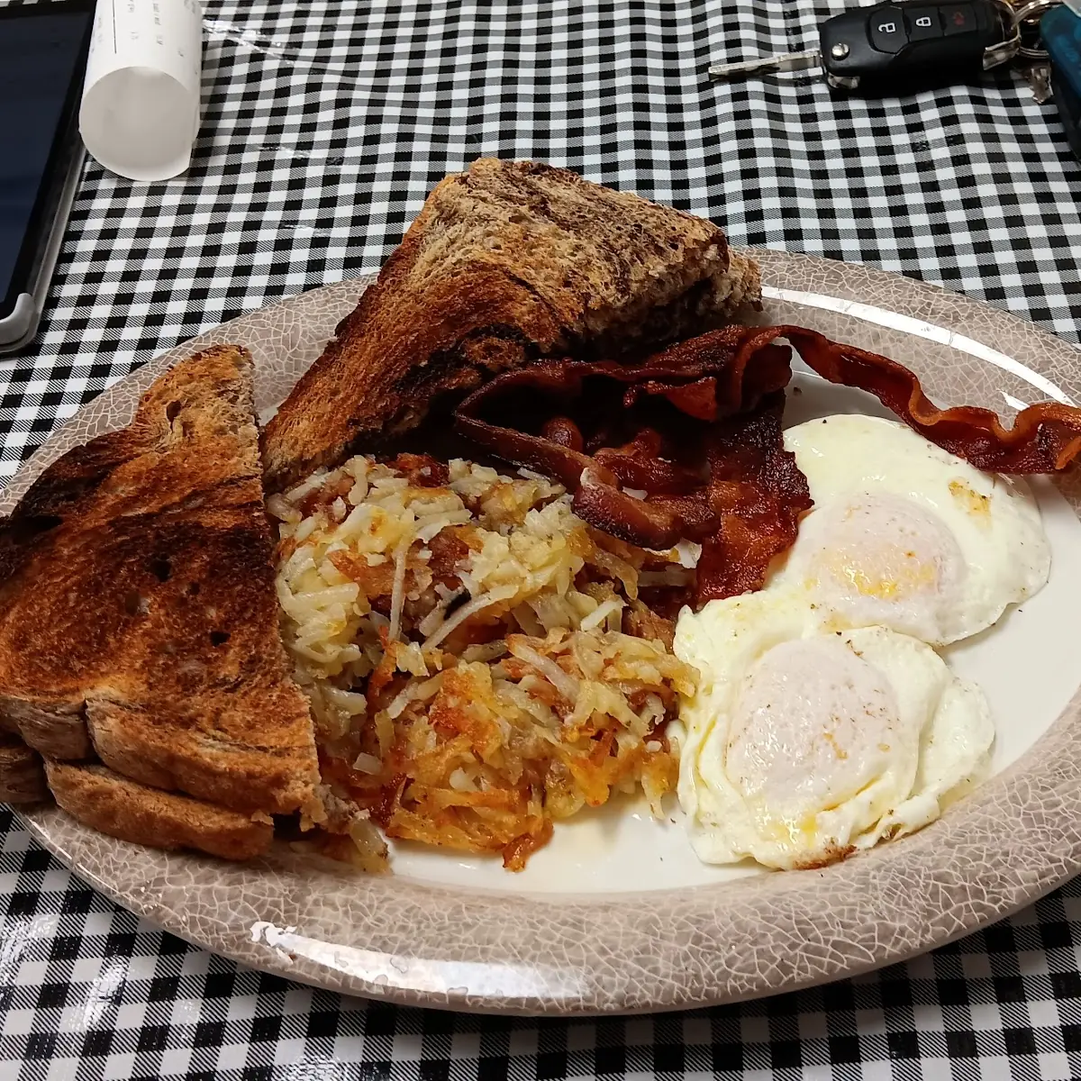 2 Eggs Hash Browns Bacon and Toast