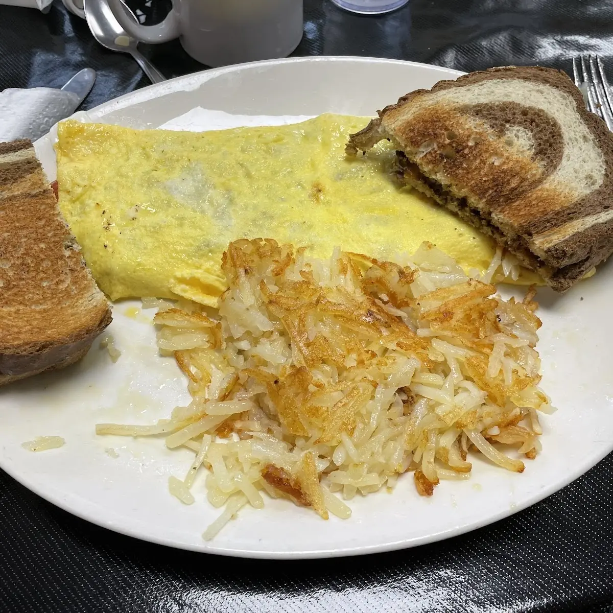 Scrambled Eggs Hash Browns and Toast