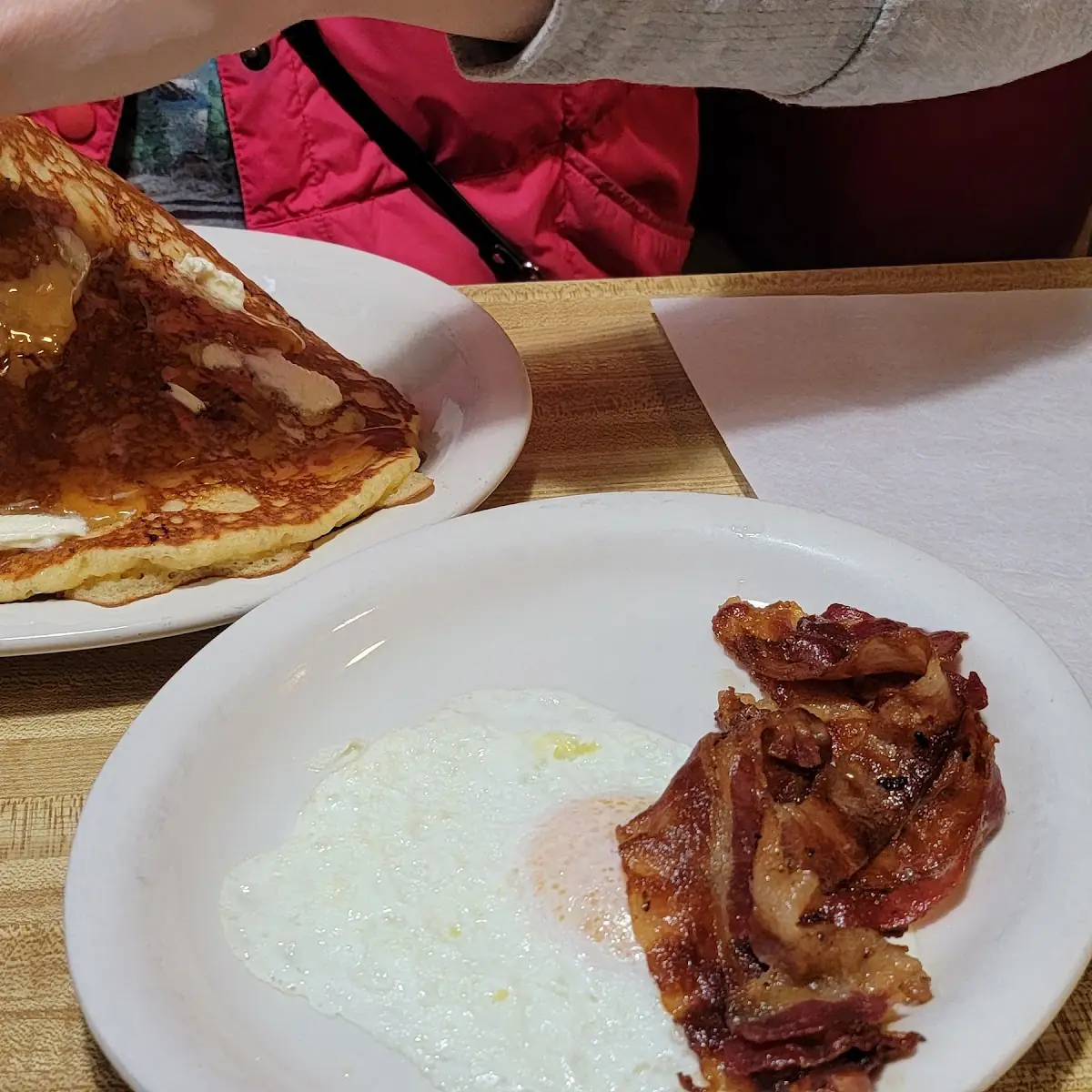 Buttermilk Pancakes with Side of Bacon and Egg over Easy