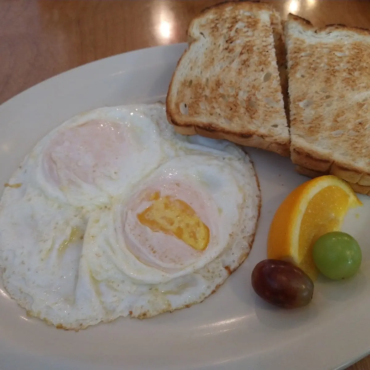 Eggs over Easy and White Toast