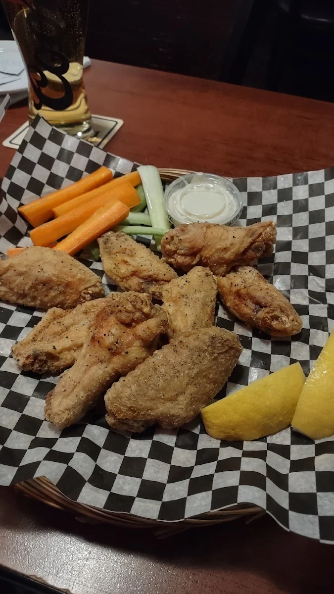 Salt and Pepper Wings with Lemon Wedges, M&M Bar and Grill
