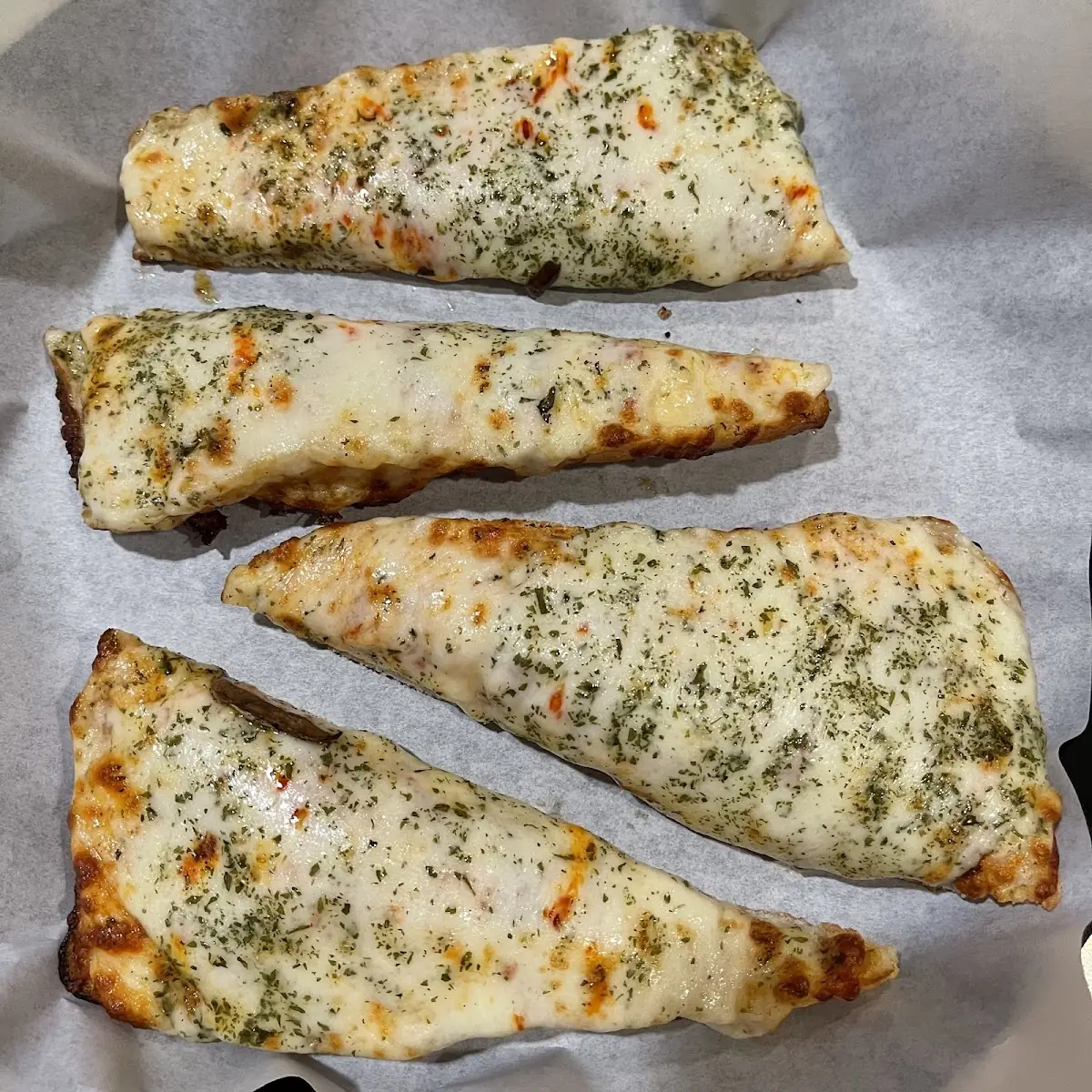 Order of Garlic Bread with Extra Garlic Sauce and Extra Cheese