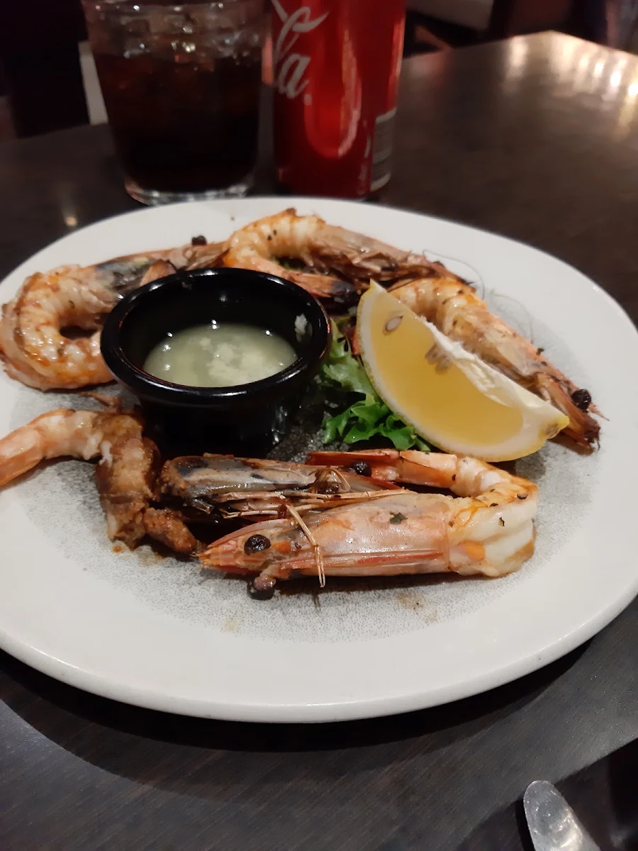 Rib Eye with Prawns & Squid, SparQling Pizza & Grill