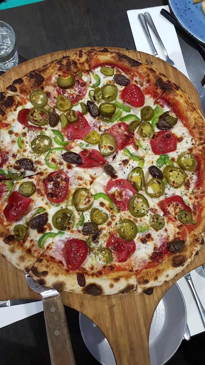 Supreme Pizza, SparQling Pizza & Grill