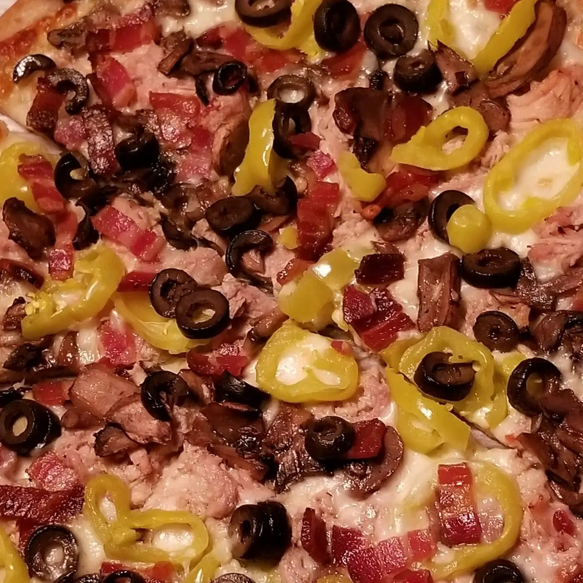 New York Style Oil and Garlic Base Pulled Chicken Prosciutto Mushrooms Banana Peppers