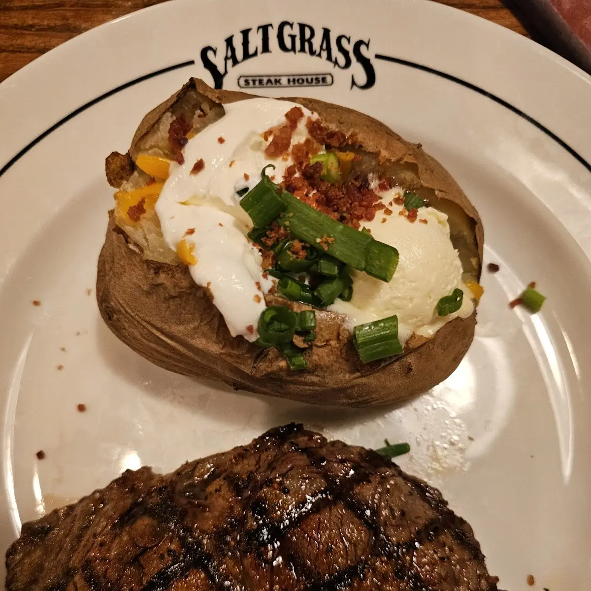 New York Strip with Loaded Baked Potatoes