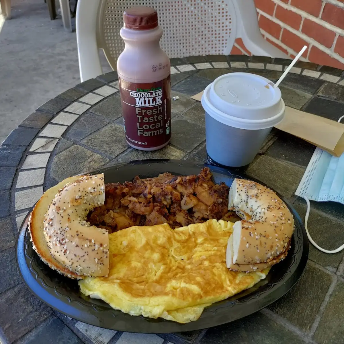 Three Egg Omelet with Hash Browns and a Bagels