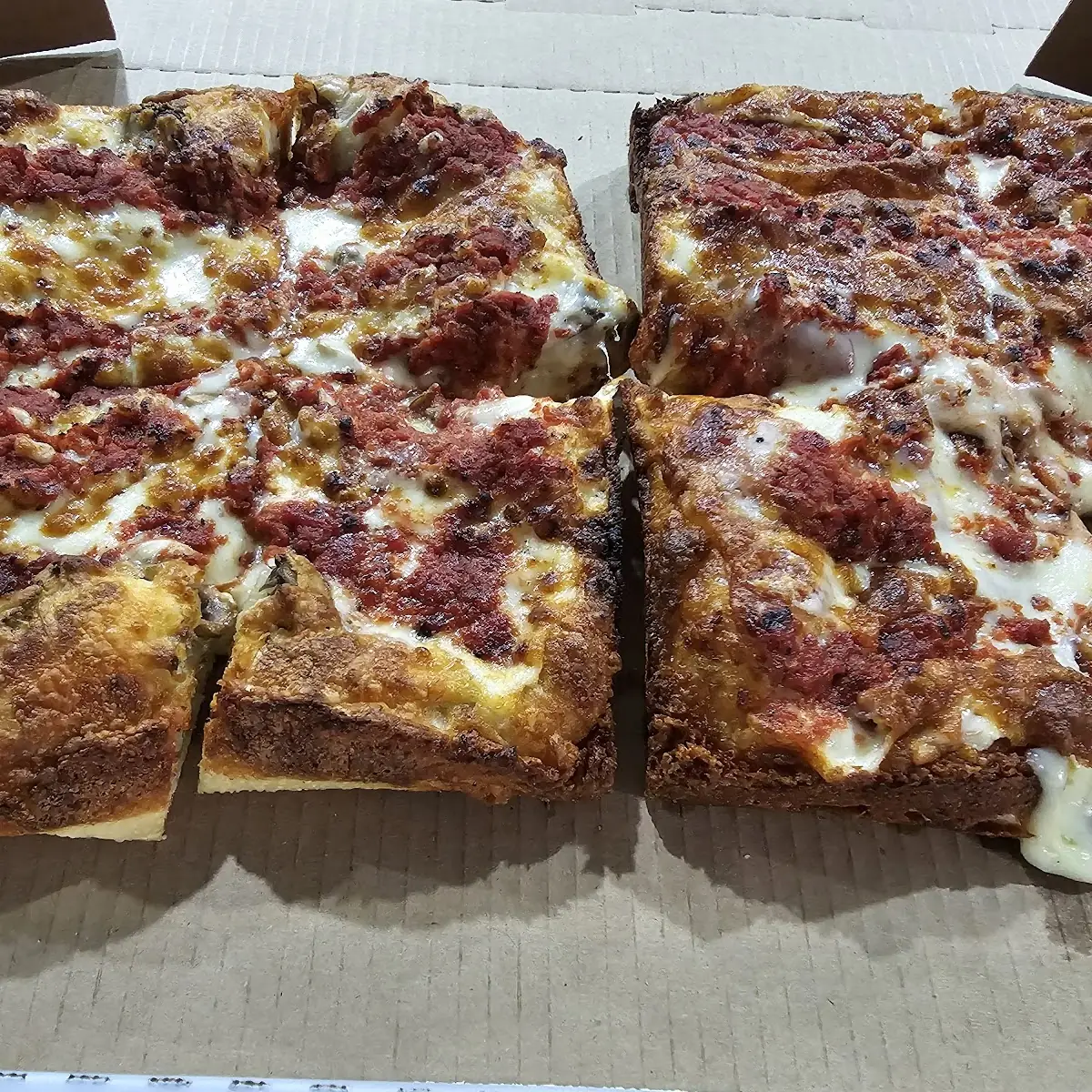 Deep Dish Pepperoni Bacon Left and Pepperoni Mushroom Right