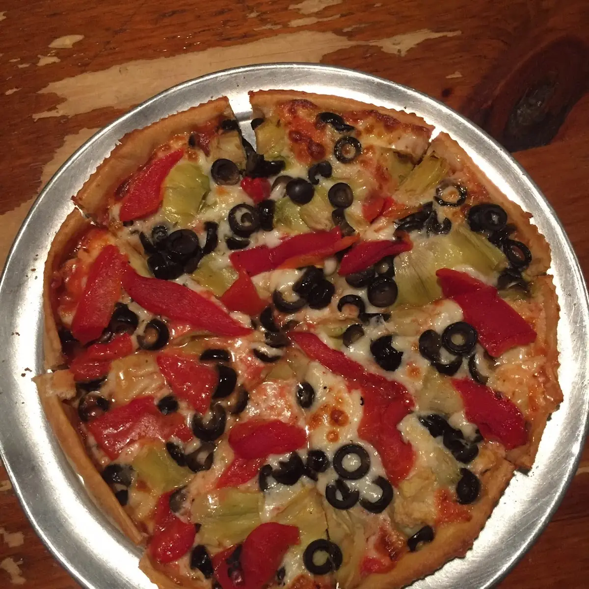 Our Famous Thin Crust Pizza Comes in 2 Sizes