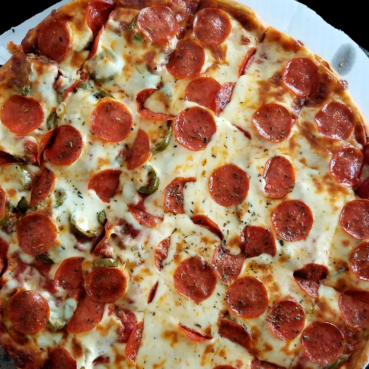 Thin Crust Pepperoni Half Sausage and Jalepeno Pizza
