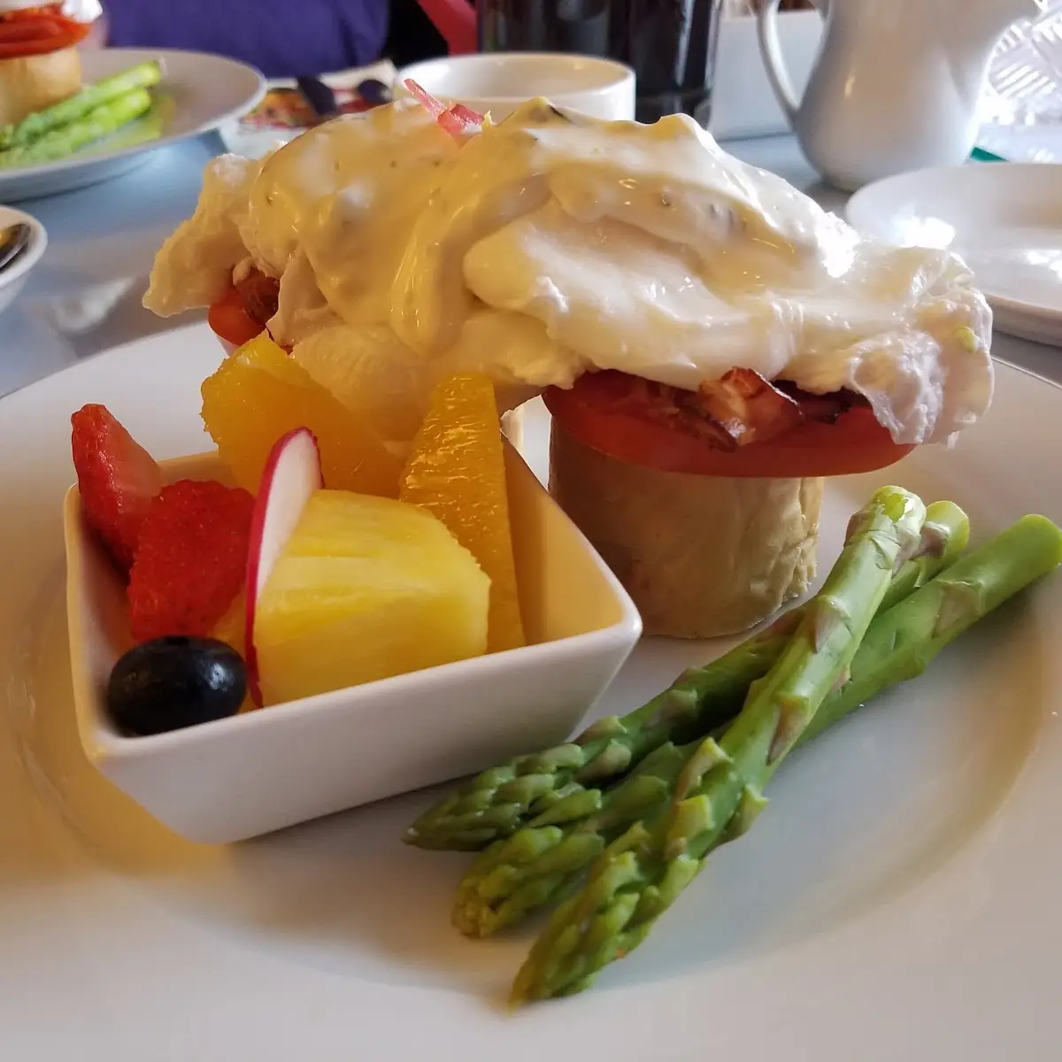 Eggs Benedict with Local Seasonal Fruit