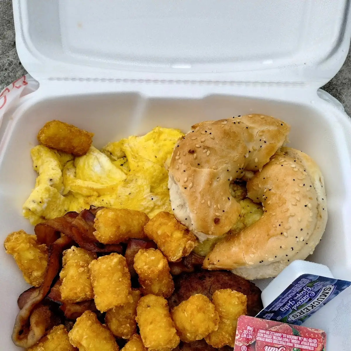 Scrambled Eggs Tater Tots Bacon and Bagel