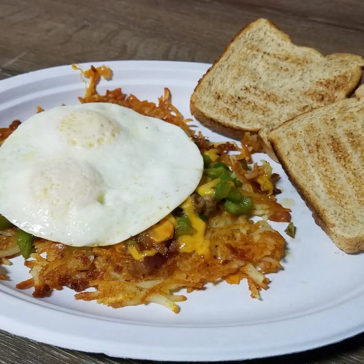 Loaded Hash Browns Egg and Toast at Oakley Grill