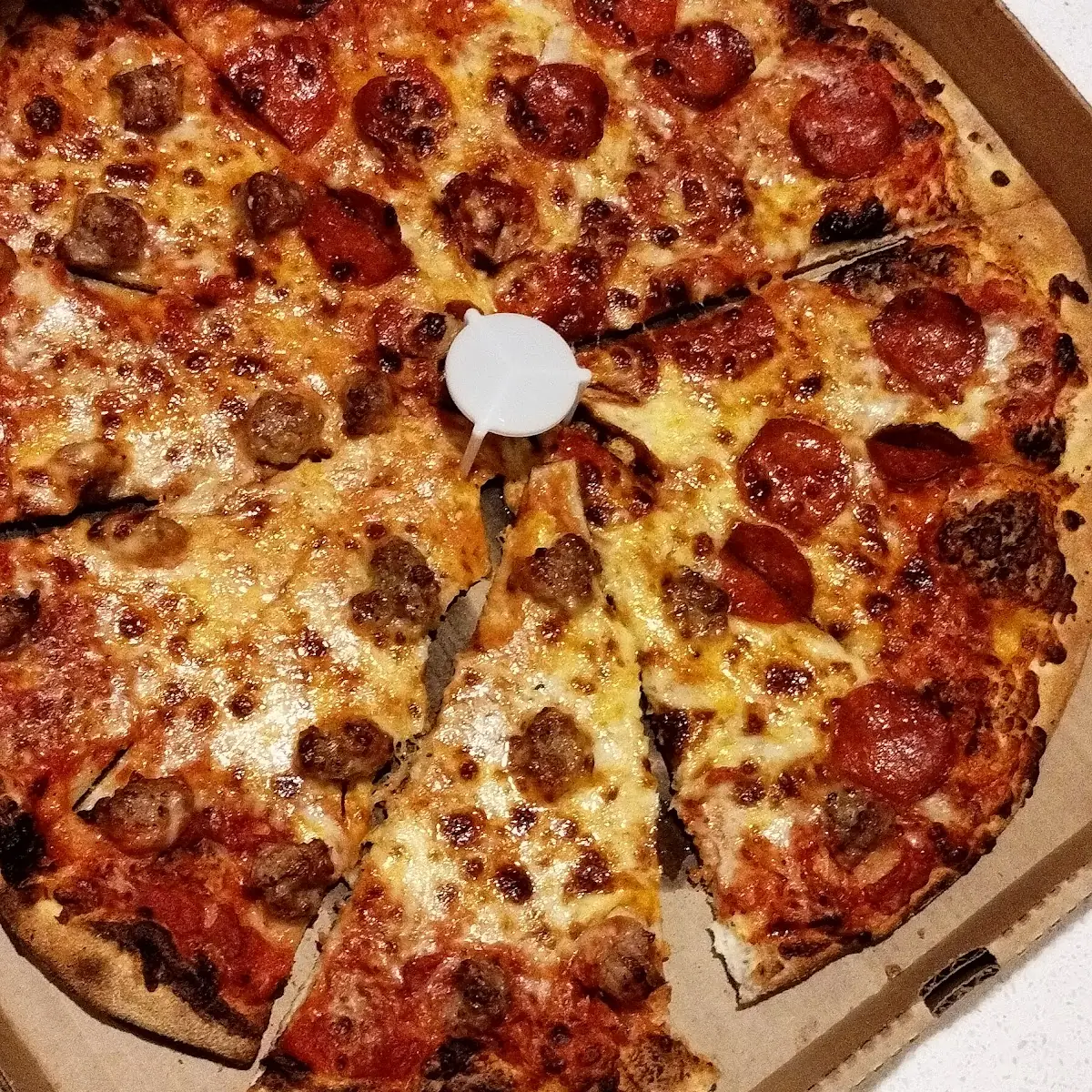 Half Pepperoni Half Sausage Pizza