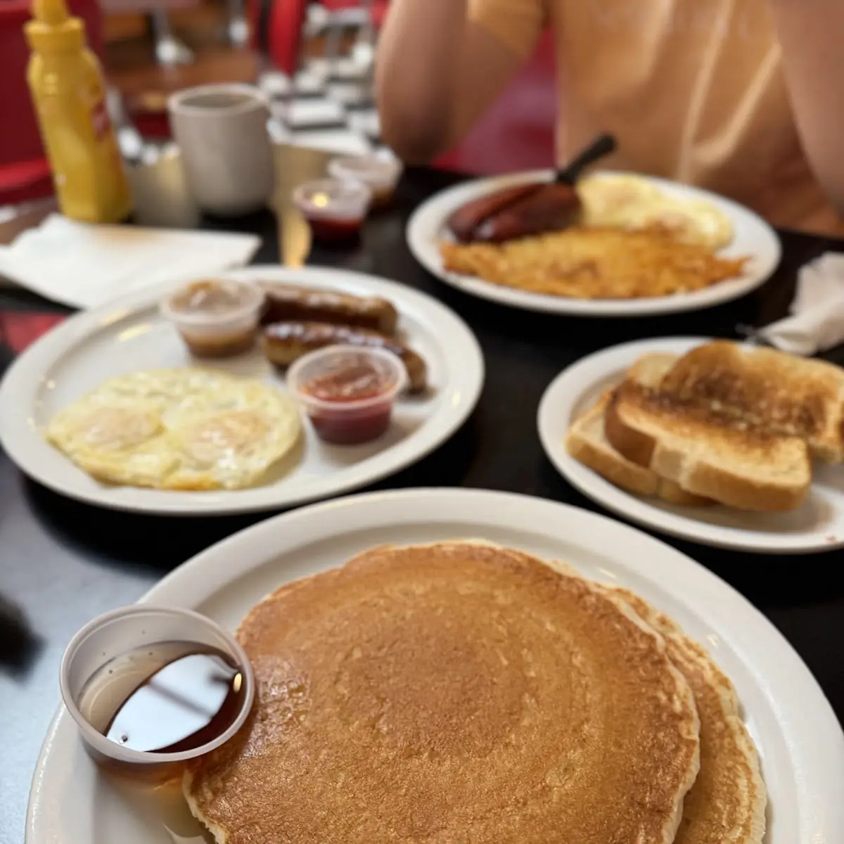 Short Stack Combination with Fried Eggs and Sausage
