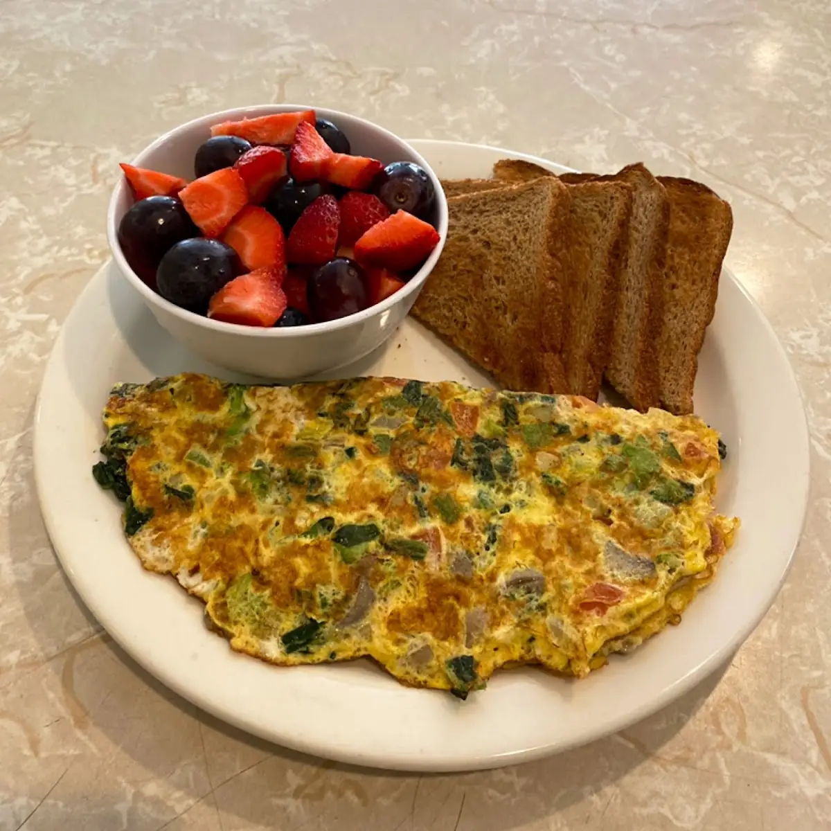 Veggie Omelette with Fruit Cup and Toast