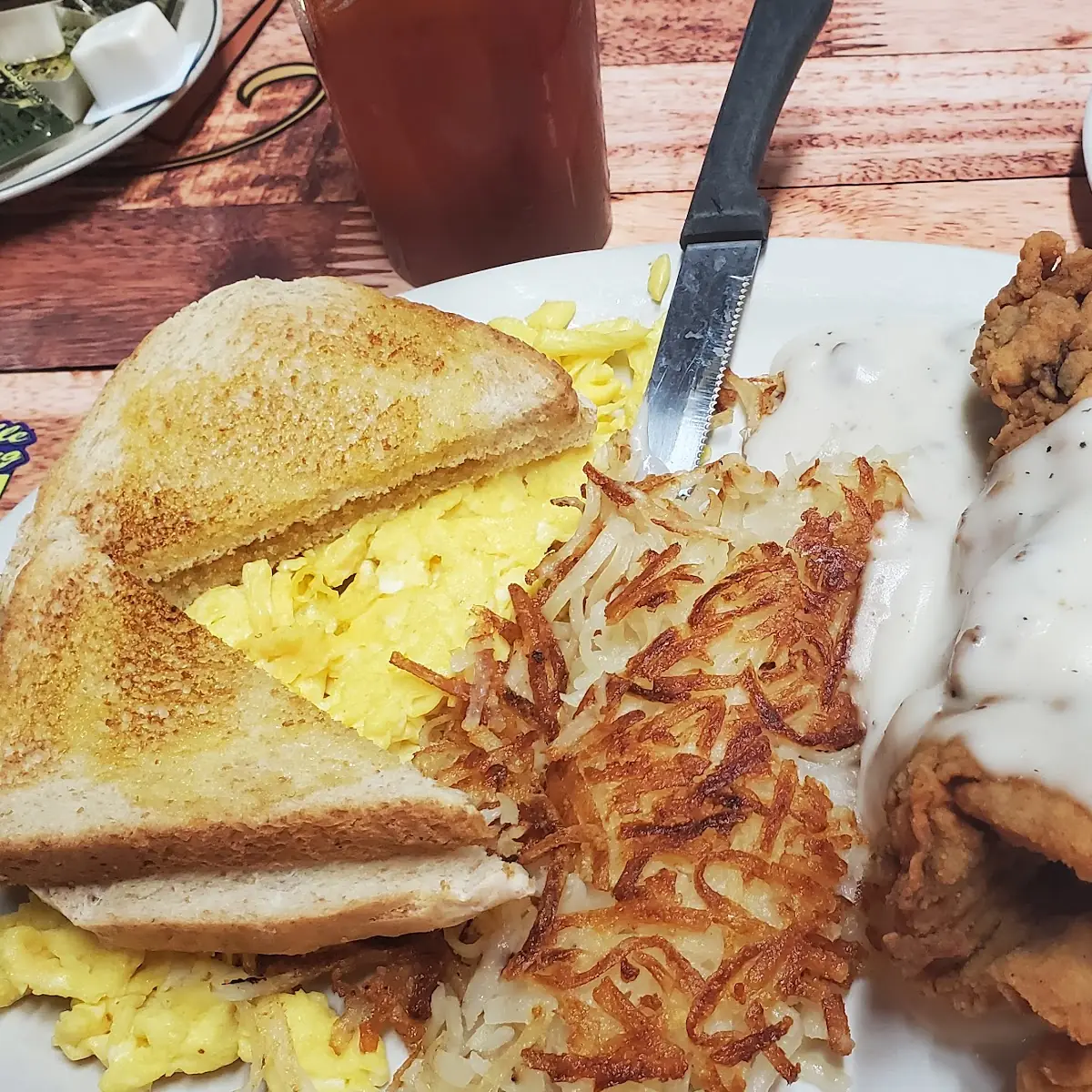 #6 1⁄4 lb. Hamburger Steak, 2 Eggs, Hashbrowns, and Toast