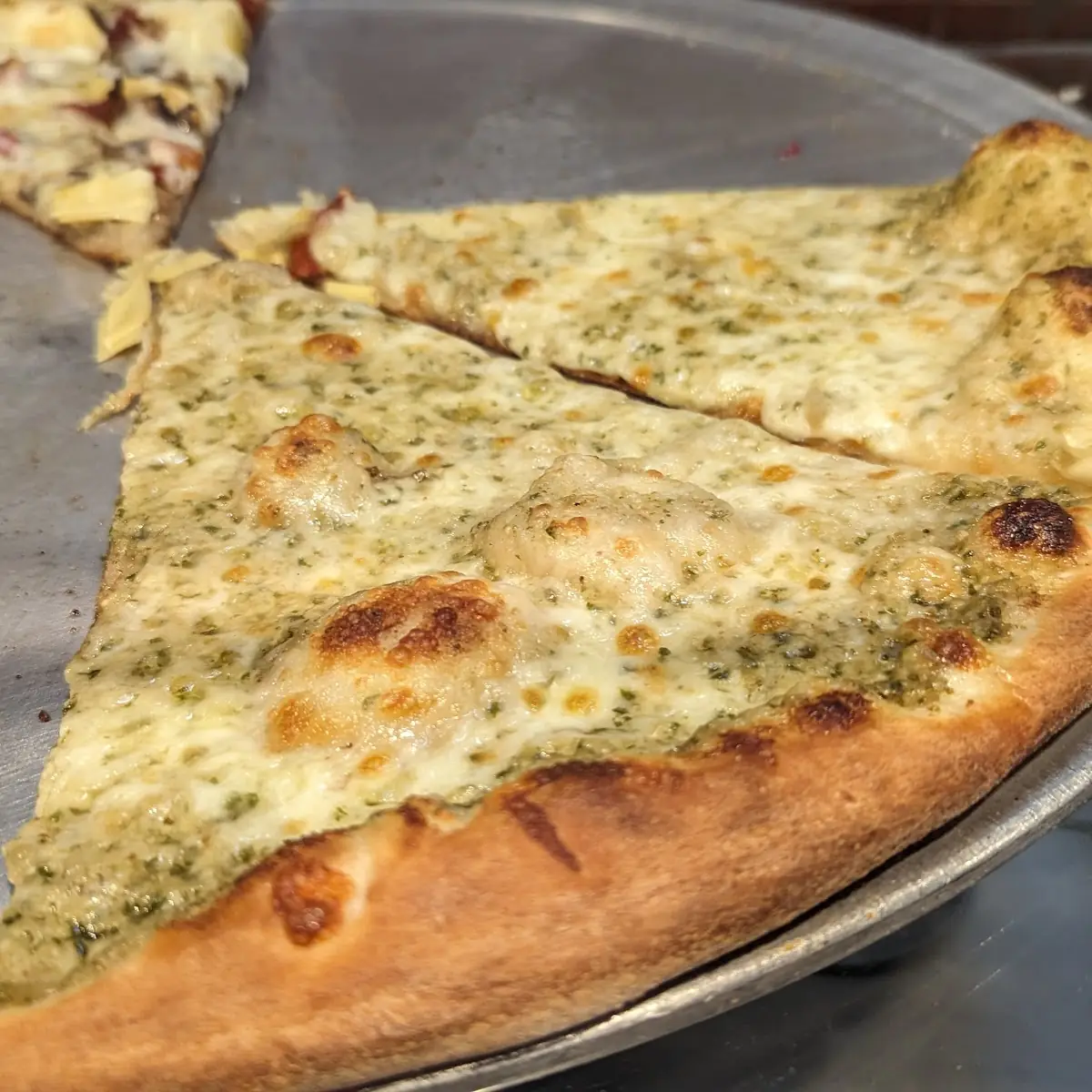 Pesto and Artichoke Pizza Slices