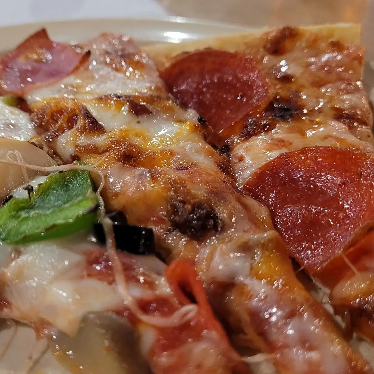 Supreme and Pepperoni Pizza