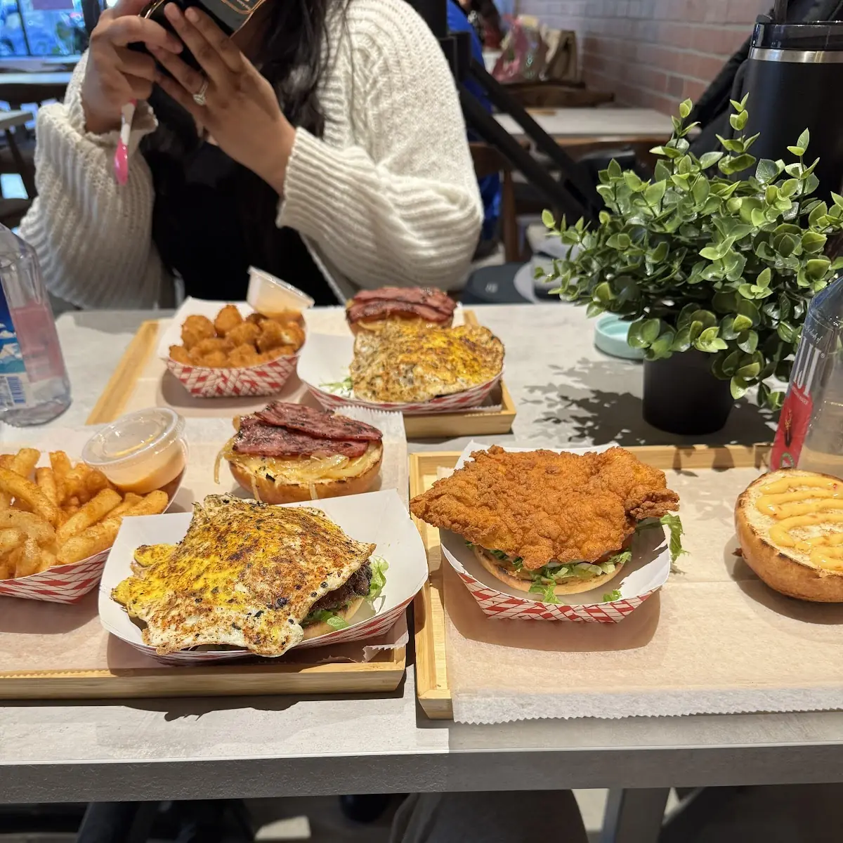 Fried Poutine Egg Bacon Cheeseburger Fried Chicken Burger and Fries