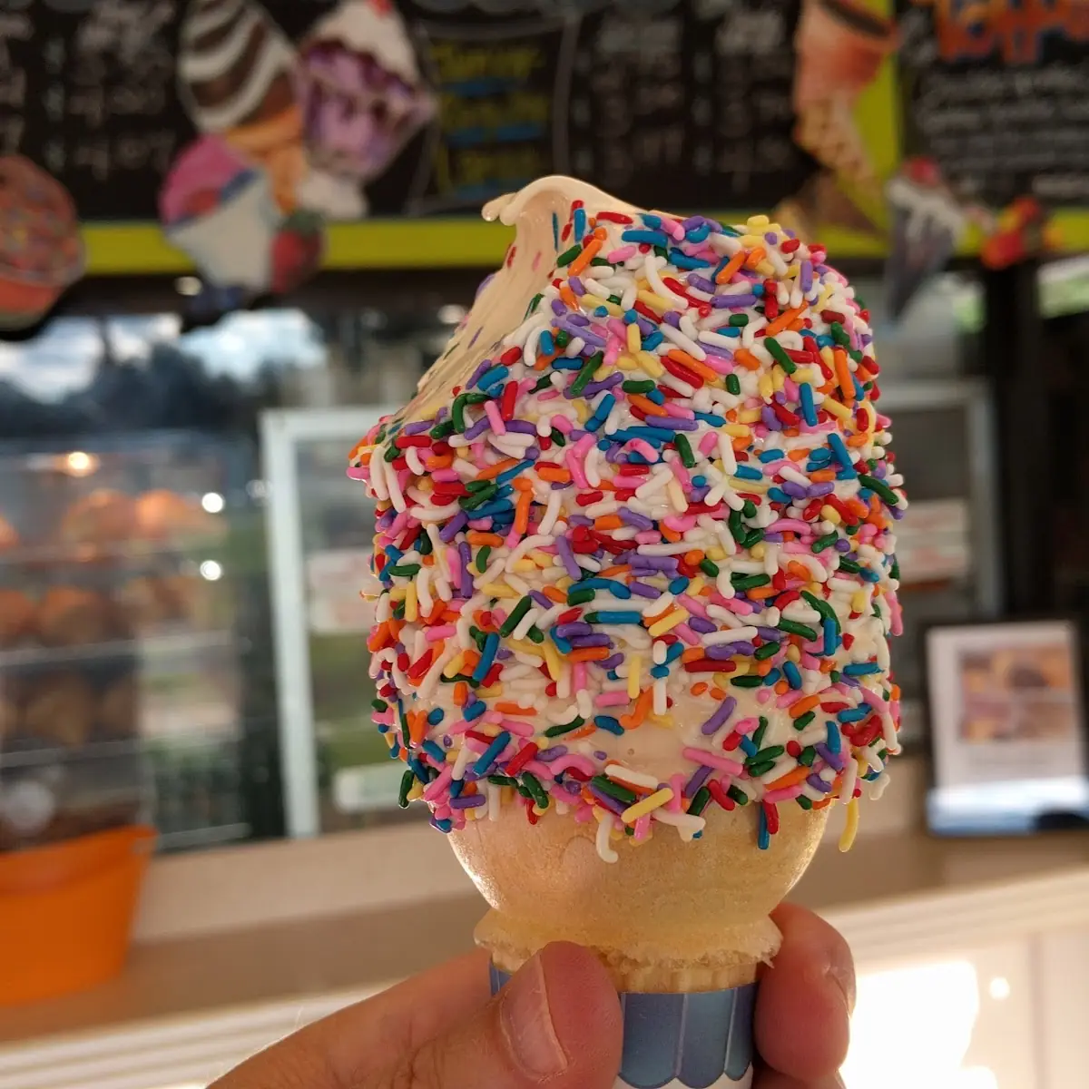 Vanilla Ice Cream Cone with Rainbow Sprinkles