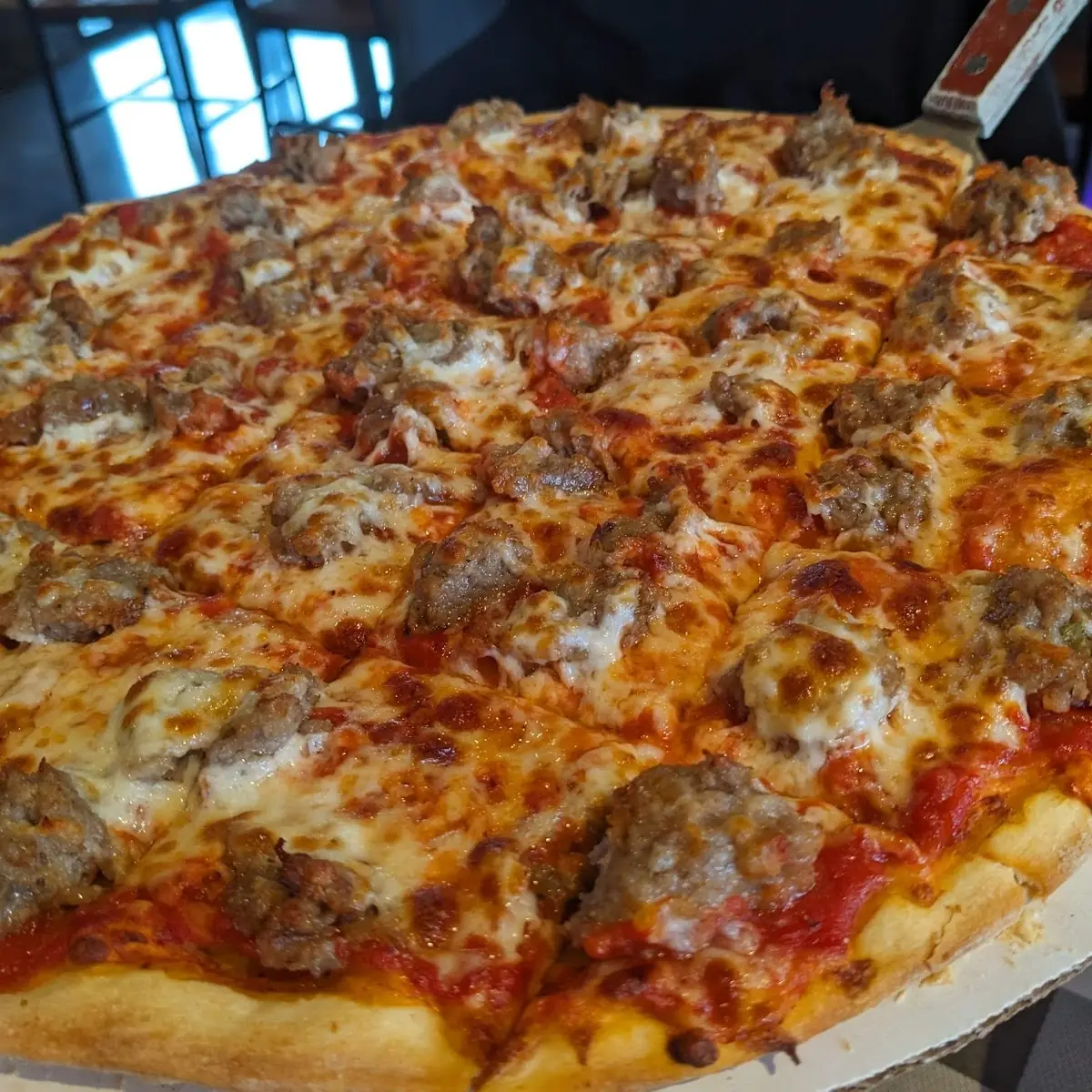 Thin Crust Sausage Pizza