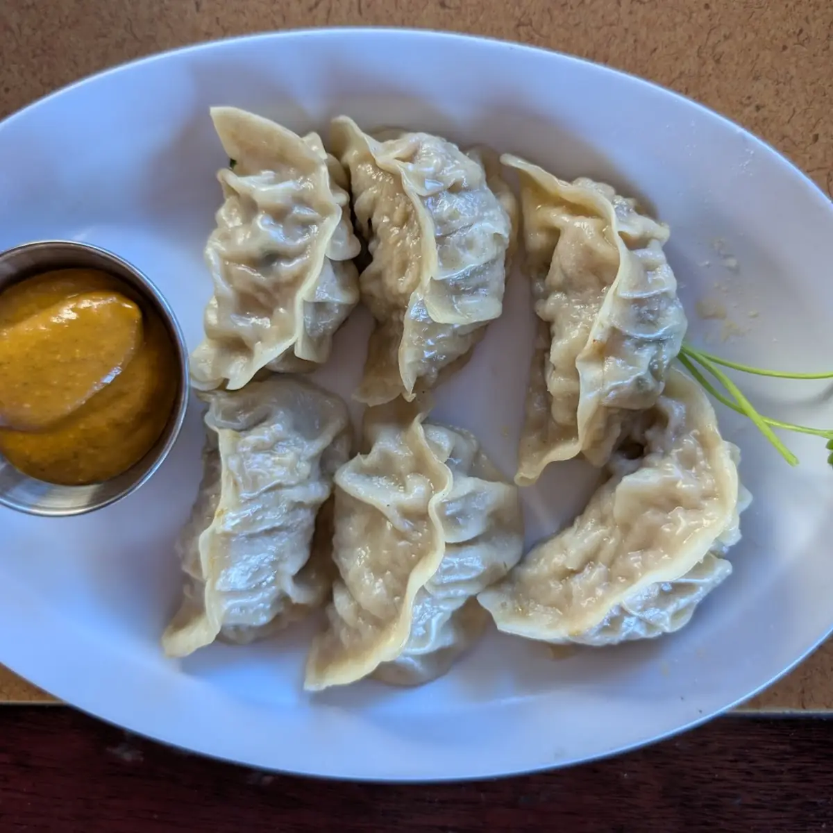 Steamed Momo Dumplings with Dipping Sauce